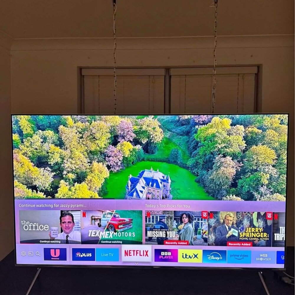 55” Samsung 4K Ultra HD HDR Smart TV.
